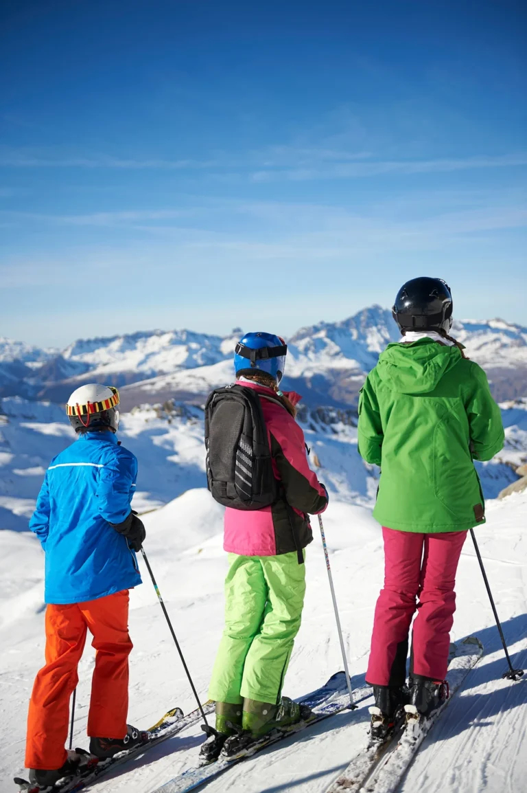 Young skiers on skiing trip, Les Arcs, Villaroger, Savoie, France
