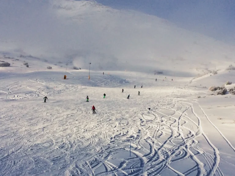 Ski slopes and people skiing